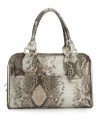 The allover embossed snakeskin, Ivanka Trump's signature lining and the pair of slip pockets demurely tucked into the front of this classic bag distinguish it from the rest this season.