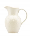 With fanciful beading and an antiqued edge, this pitcher from the Lenox French Perle white dinnerware collection has an irresistibly old-fashioned sensibility. Hard-wearing stoneware is dishwasher safe and, in a soft white hue, a graceful addition to every meal. Qualifies for Rebate