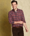 Change your button front pattern with this classic plaid shirt from Tommy Hilfiger.