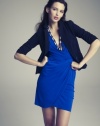 Dress up a sheath or wrap dress with this sleek blazer by Eliza J.