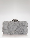 Like a piece of cocktail jewelry, this Sondra Roberts clutch instantly dresses up your evening looks. This artful design flaunts a boxy shape, cast in glossy satin and chiffon.