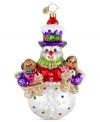 A snowman dusted with sugary sparkles and clutching two gingerbread men makes the One Sweet Trio ornament a very tempting addition to any tree. Handcrafted by Christopher Radko.