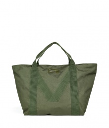 Perfect for travel, running errands or toting around gym essentials, Marc by Marc Jacobs carryall tote is as stylish as it is versatile - Double top handles with M patterning on front and back, top zip closure, front logo patch, inside zippered back wall pocket - Wear with sporty outerwear, casual separates and fashion sneakers Perfect for travel, running errands or toting around gym essentials, Marc by Marc Jacobs carryall tote is as stylish as it is versatile - Double top handles with M patterning on front and back, top zip closure, front logo patch, inside zippered back wall pocket - Wear with sporty outerwear, casual separates and fashion sneakers