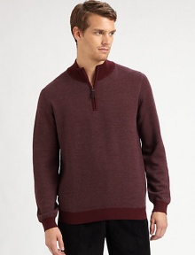 A sporty pullover with a sophisticated mockneck collar in a fine, textured diagonal knit.Ribbed mockneck collarHalf-zip frontLong sleeves with ribbed cuffsRibbed hemMerino woolDry cleanImported A sporty pullover with a sophisticated mockneck collar in a fine, textured diagonal knit.Ribbed mockneck collarHalf-zip frontLong sleeves with ribbed cuffsRibbed hemMerino woolDry cleanImported