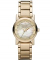 A great everyday watch that's gloriously gilded, by DKNY. Goldtone ion-plated stainless steel bracelet and brushed round case. Champagne mother-of-pearl sunray dial with goldtone stick indices and logo. Quartz movement. Water resistant to 50 meters. Two-year limited warranty.