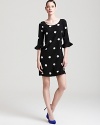 Embrace a classic feminine style in this kate spade new york dress, touting flared elbow sleeves for retro charm.