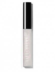 A gorgeous combination of light-catching glitter and non-sticky shine. Part of Bobbi's Caviar & Oyster Collection, this iridescent shade creates a pearly, nude lip: a perfect pairing for dark, intense eyes. The formula is enriched with emollients and Vitamins C and E to moisturize, condition and protect lips, too. Made in Canada. A gorgeous combination of light-catching glitter and non-sticky shine. Part of Bobbi's Caviar & Oyster Collection, this iridescent shade creates a pearly, nude lip: a perfect pairing for dark, intense eyes. The formula is enriched with emollients and Vitamins C and E to moisturize, condition and protect lips, too. Made in Canada.