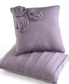 Vertical pleated bands in tonal purple hues make a chic statement in this Neveah decorative pillow for a completely casual appeal.