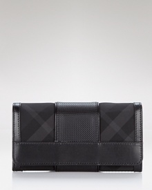 A tonal check lends luxe, modern style to this bifold wallet from Burberry.