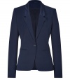 With its sharply tailored fit and contemporary satin label, Hugos dark blue blazer is an all-season essential - Peaked lapel, long sleeves, slit cuffs, two button closures, front slit pockets - Tailored fit - Pair with a crisp white shirt and jeans, or dress up for work with a pencil skirt and peep-toes