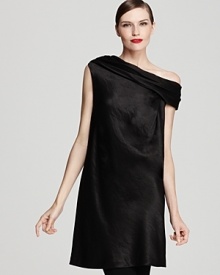 When the clock strikes five, shed the blazer and slip the wide cowl neckline of this Donna Karan New York tunic off your shoulders for a cocktail-ready look with subtle shine.