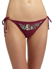 THE LOOKElastic waist and leg openingsFront band of beads and sequins in an ornate paisley patternSide tiesTHE MATERIAL80% nylon/20% spandexFully linedCARE & ORIGINHand washImportedPlease note: Bikini top sold separately. THE LOOKElastic waist and leg openingsFront band of beads and sequins in an ornate paisley patternSide tiesTHE MATERIAL80% nylon/20% spandexFully linedCARE & ORIGINHand washImportedPlease note: Bikini top sold separately.