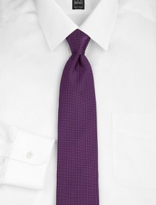 An intricate pindot pattern woven with premiere silk luxury. Silk; dry clean Made in USA An intricate pindot pattern woven with premiere silk luxury. Silk; dry clean Made in USA