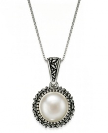 Dedicated to elegance. This beautiful cultured freshwater pearl necklace (11-1/2-12mm) sits in an intricately-engraved sterling silver setting. Approximate length: 19 inches. Approximate drop: 1 inch. Dedicated to elegance. This beautiful cultured freshwater pearl necklace (11-1/2-12mm) sits in an intricately-engraved sterling silver setting. Approximate length: 19 inches. Approximate drop: 1 inch.