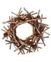 A cluster of twigs and pine cones create a comforting, wintry home accent in this holiday wreath from Winward.