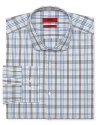 A smart, modern graphic pattern is crafted in superior cotton for a comfortable look and feel, and with a slim fit, this fine dress shirt reflects well on your discerning taste.