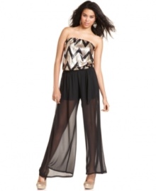 Primed for the dance floor, this jumpsuit from Urban Hearts totally electrifies with its sequined bodice and sheer palazzo pants! Primed for the dance floor, this jumpsuit from Urban Hearts totally electrifies with its sequined bodice and sheer palazzo pants!