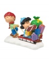 Rerun plays reindeer, pulling bossy sister Lucy and her presents home on their little red sleigh in this adorable figurine from the Peanuts Village collection. From Department 56.