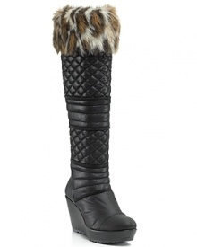 Fight the freeze in elevated style with these quilted wedge boots, accented with soft faux fur. By GUESS.