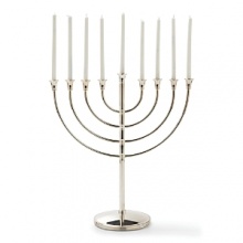 A new heritage piece for your family, this classic and elegant menorah is crafted from Christofle silver. A new heritage piece for your family, this classic and elegant menorah is crafted from Christofle silver.