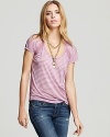 This Hurley tee flaunts mesh inserts at the neckline and back for visual interest and an unexpected hint of skin.