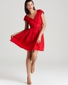 A fresh reinvention of prim '50s chic, this Nanette Lepore dress flaunts a showstopping hue and ladylike construction.