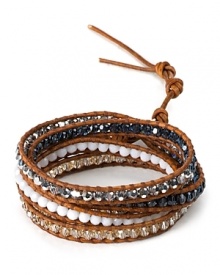 Take your wrist in a bohemian direction with Chan Luu's textured wrap bracelet. Contrasting tawny brown leather with inset crystal stones, this eclectic piece is perfect for layering.