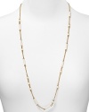 Chic colored enamel breaks up this long and lovely gold-tone chain necklace from kate spade new york. Wear it as a single strand or layered among others for a effortless, self-styled look.