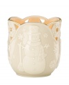 Carved snowflakes flurry around a cheerful snowman in smooth porcelain upon this Merry Lights Snowman votive holder from Lenox. A gold scalloped trim coordinates this home accent with any favorite Lenox fine dinnerware or giftware.