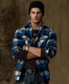 Designed in a plaid wool, the long-sleeved shirt is tailored for warm, casual style.