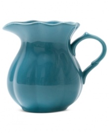 Splash of color. Bring more fun to every table with the bright blue finish and ruffled edge of Marcela's pitcher for Prima Design. Splash of color. Bring more fun to every table with the bright blue finish and ruffled edge of Marcela's pitcher for Prima Design.