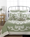 Serene green dream. With a look of whimsical beauty, this Aliani quilt boasts a luxurious landscape of embroidery with fluid flourish designs. Pair with coordinating shams and decorative pillows for the full effect.