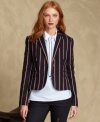 Tommy Hilfiger's fitted blazer makes a bold statement with preppy stripes, perfect for layering with button-front shirts and jeans.