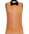 Detailed with a cute bowtie and sultry open back, Moschino C&Cs apricot sleeveless knit top is a fun feminine choice for dressing up your look - Short stand-up collar with black satin trim and bowtie, sleeveless, fine ribbed trim, slit back, snap closures at the nape - Fitted - Wear with figure-hugging separates and platform peep-toes
