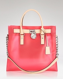Practical style proves playful with this oversized tote from MICHAEL Michael Kors. In a bold hue and chic silhouette, this bag is clearly a trendsetting choice. Practical style proves playful with this oversized tote from MICHAEL Michael Kors. In a bold hue and chic silhouette, this bag is clearly a trendsetting choice.