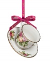 If you love it on your table, you'll adore it on the tree. This Old Country Roses ornament bears the classic pink and gold florals of Royal Albert's famed dinnerware collection in a mini teacup and saucer.