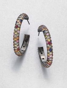 Faceted sapphires in a rainbow of shades are set in neat rows along these graceful open hoops.SapphiresBlack rhodium-plated sterling silverDiameter, about 2.5Post backImported