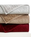 Double loft for twice the comfort! Snuggle up to two luxuriously soft textures with Berkshire's Double Loft blanket, featuring smooth, indulgent faux-fur on one side and pin-point quilting on the other for high loft and a plush feel. Pill-resistant. Packaged for easy gifting. (Clearance)