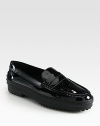 A durable rubber trek sole elevates this moccasin-inspired staple in luxurious Italian patent leather. Patent leather upperLeather liningRubber trek solePadded insoleMade in ItalyOUR FIT MODEL RECOMMENDS ordering true size. 