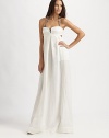 An ethereal coverup with edge courtesy of its strapless, back-tie design.Strapless designEmpire waistSlash pocketsBack tie closureLinenHand washImported