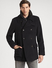 A key wardrobe essential to keep you both stylish and warm this winter, handsomely crafted in Italy of a luxurious wool, nylon and cashmere blend with an interior, removable gilet vest.Button-frontZippered chest, waist flap pocketsAbout 30 from shoulder to hem70% wool/20% nylon/10% cashmereDry cleanMade in Italy A key wardrobe essential to keep you both stylish and warm this winter, handsomely crafted in Italy of a luxurious wool, nylon and cashmere blend with an interior, removable gilet vest.Button-frontZippered chest, waist flap pocketsAbout 30 from shoulder to hem70% wool/20% nylon/10% cashmereDry cleanMade in Italy