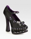 Rhinestone-covered satin silhouette, with a high vamp, adjustable strap and intricate beading. Self-covered heel, 5¾ (145mm)Covered platform, 1¾ (45mm)Compares to a 4 heel (100mm)Rhinestone and bead-covered satin upperLeather lining and solePadded insoleMade in Italy