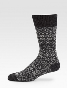 A timeless fair isle pattern adorns this wool-blend dress essential.Mid-calf height45% wool/33% polyamide/18% viscose/4% angoraMachine washImported A timeless fair isle pattern adorns this wool-blend dress essential.Mid-calf height45% wool/33% polyamide/18% viscose/4% angoraMachine washImported