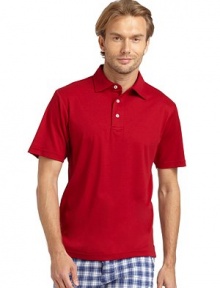 THE LOOKSmooth ice cotton designTreated and finished to be cool to the touchPolo collarFront button placketShort sleevesVented shirttail hemTHE MATERIALCottonCARE & ORIGINMachine washImportedThis item was originally available for purchase at Saks Fifth Avenue OFF 5TH stores. 
