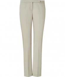 Stylish pants in fine beige stretch cotton - Wonderfully comfortable thanks to spandex - Short cuff with side pockets - Figure-flattering creases create slim look - Classic office or evening trousers, have mix of serious and modern - Pair with a matching blazer, silk blouse and heels