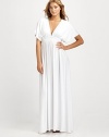There's nothing quite like a coverup made from dreamy, soft fabric that features a seductive v-neckline and open back.V-neckEmpire waistPull-on styleSelf-tie open backFully linedAbout 60 from shoulder to hem96% modal/4% elastaneDry cleanImported of Italian fabric