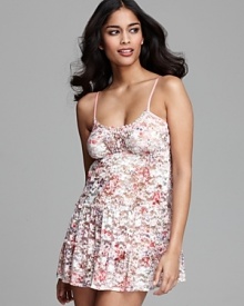 Make a bedroom statement in this sleeveless chemise with a floral lace bodice and three tiers ruffle trim. Make a bedroom statement in this sleeveless chemise with a floral lace bodice and three tiers ruffle trim.