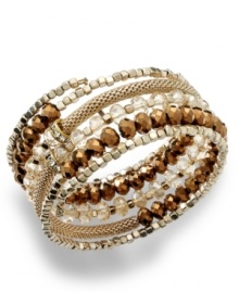 Wrap your wrists with edgy glam. INC International Concepts' coil bracelet features a mix of glass and plastic rondelles with a snake chain. Set in 12k gold-plated mixed metal. Approximate length (when stretched): 7 inches. Wrap your wrists with edgy glam. INC International Concepts' coil bracelet features a mix of glass and plastic rondelles with a snake chain. Set in 12k gold-plated mixed metal. Approximate length (when stretched): 7 inches.