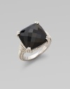 From the Giftables Collection. A sparkling black onyx stone in a four-prong sterling silver setting.Black onyxSterling silverWidth, about ½Imported 