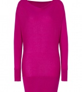 Paint bright color into your chic knitwear collection with DKNYs radiant hot pink pullover - Wide neckline, dolman long sleeves, fine ribbed trim - Long, lean fit - Wear as a mini-dress with opaque tights, or layer over leather leggings with sleek ankle boots